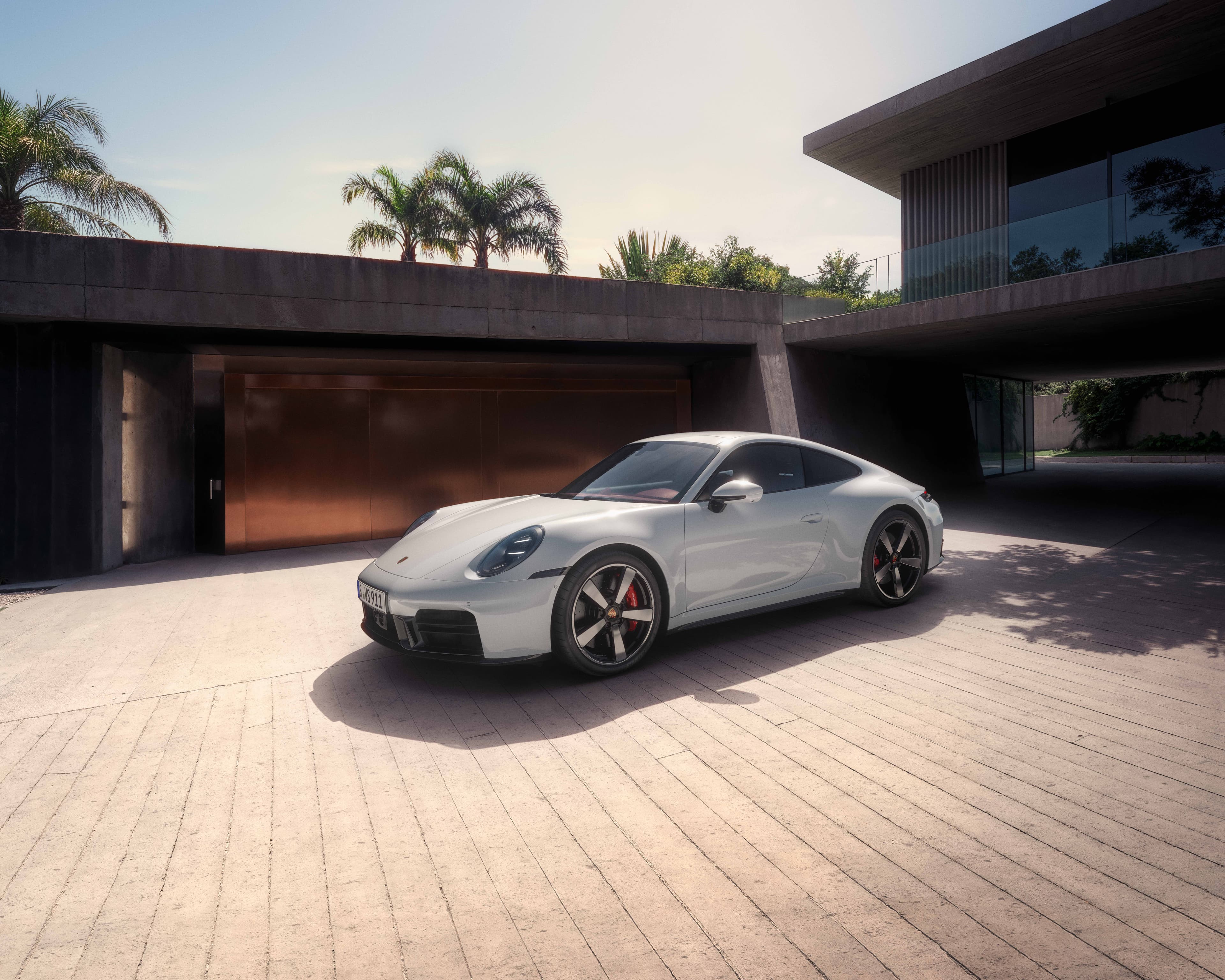 Essens eines Sportwagens: \n Der 911 Carrera S \n für EUR 1992,-/Monat.